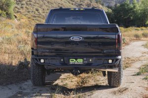 Ford F-150 Rear Bumper - DV8 Offroad - Tube design, Single exhaust models - Micro-texture black powder coat - `21-`26